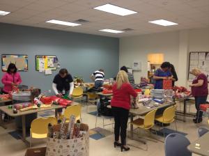 CSC staff members wrapped the gifts for local children.