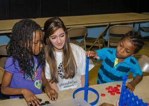 Youth leader and guest blogger Natalie Martinez (center) has been volunteering with HandsOn Broward since 2011.